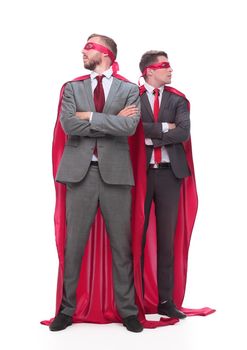 two business men superheroes standing together. isolated on white