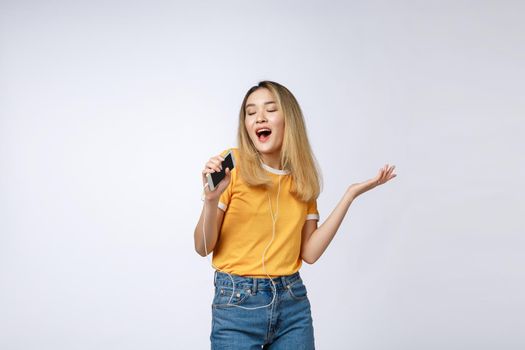 Beautiful asian woman sing a song, portrait studio on white background.