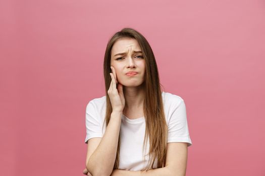 Young caucasian woman over isolated background touching mouth with hand with painful expression because of toothache. Dentist concept
