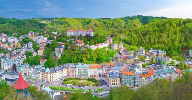 Karlovy Vary city aerial panoramic view with row of colorful multicolored buildings