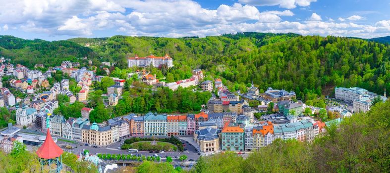 Karlovy Vary city aerial panoramic view with row of colorful multicolored buildings
