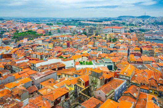 Aerial panoramic view of Porto Oporto city historical centre with red tiled roof typical buildings