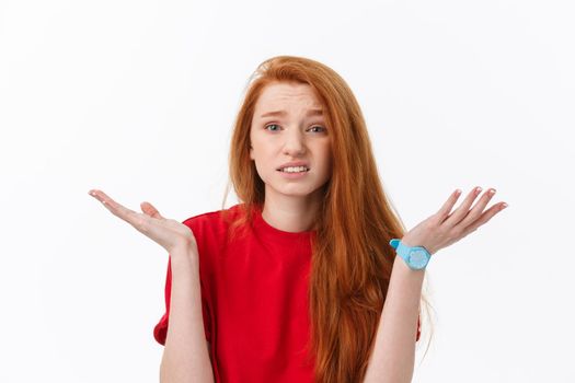 Young stressed european blonde woman looking at camera isolated on white background.