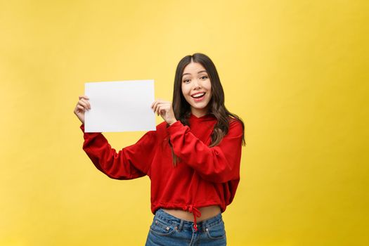 Asian young woman holding blank board or paper