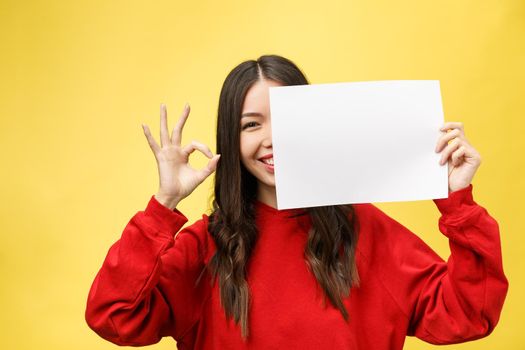 girl holds a white sheet in hands, an office worker shows a blank sheet.