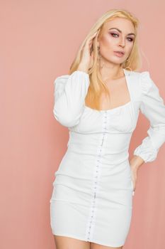 Woman in white dress with long sleeve