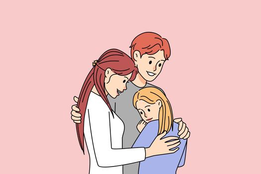 Happy family with kid hugging