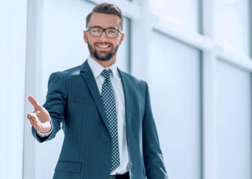 confident businessman pointing at you