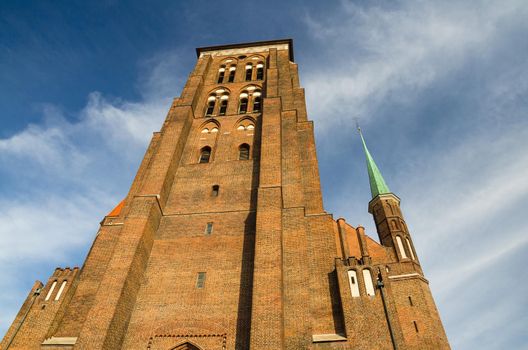 Brick building tower with spires of St Marys Church, Gdansk, Poland