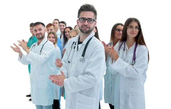 confident head standing ahead of young medical colleagues