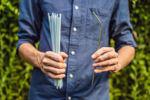 Steel drinking vs disposable straws in hands. Zero waste concept