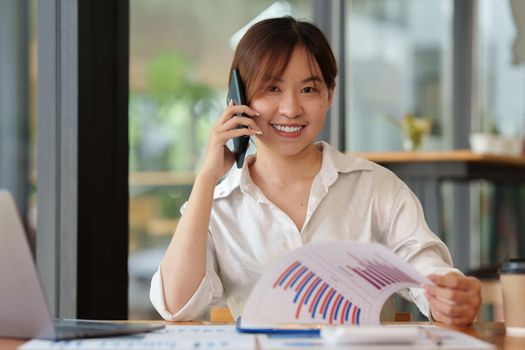 Portrait of Asian Business woman consult advice to customer about finance plan. Account concept.