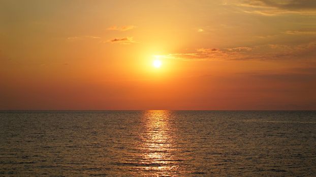 Sunset over the Black Sea. Evening sun over the horizon. Beauty world natural outdoor travel background.