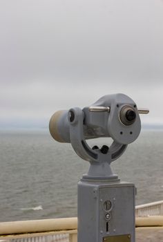 tourist binoculars for sightseeing from the highest point. Vertical view