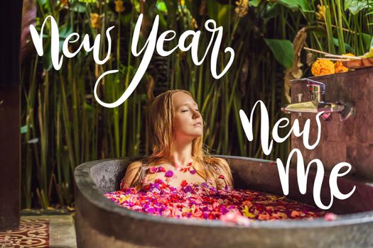 NEW YEAR NEW ME concept Attractive Young woman in bath with petals of tropical flowers and aroma oils. Spa treatments for skin rejuvenation. Alluring woman in Spa salon. Girl relaxing in bathtub with flower petals. Luxury