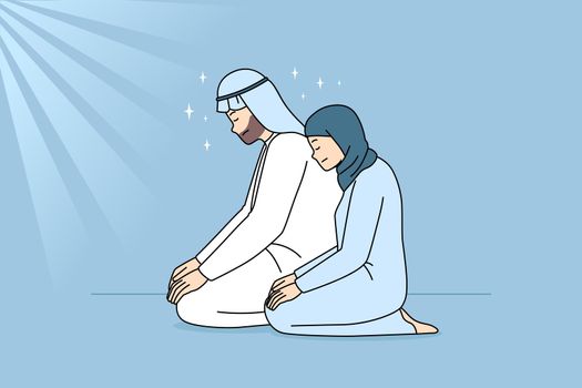 Muslim man and woman praying