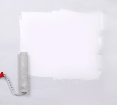 square painted white with the paint roller, on a white sheet of
