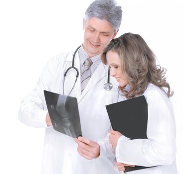 Professional medical team with doctors and surgeon examining pa
