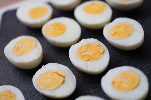 Chicken halves boiled eggs set, close-up