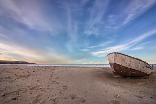 lonely old boat on the beach