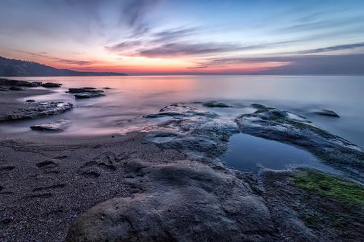 Sea heart. Magnificent sea sunrise at the rocky coast near Varna, Bulgaria