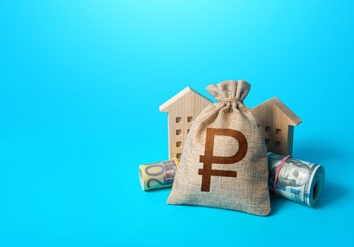 Houses and russian ruble money bag. Building up capital, saving from inflation risks. Real estate. Savings. Declaration, taxes payment. Bookkeeping and accounting. Asset, financial resource management
