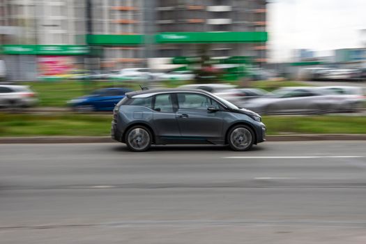 Ukraine, Kyiv - 20 April 2021: Gray BMW i3 car moving on the street. Editorial