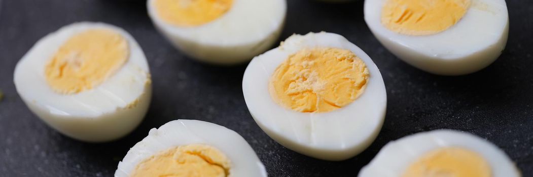 Chicken halves boiled eggs set, close-up