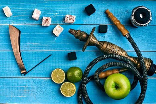 Tobacco background. Turkish smoking hookah with tobacco flavor of ripe green apple and lime