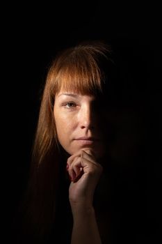 Portrait of woman face in dark