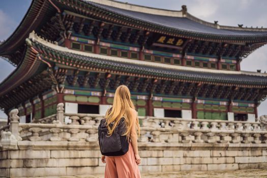 Woman tourist in korea. Gyeongbokgung Palace grounds in Seoul, South Korea. Travel to Korea concept