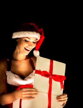 santa woman opening the magical Christmas present box