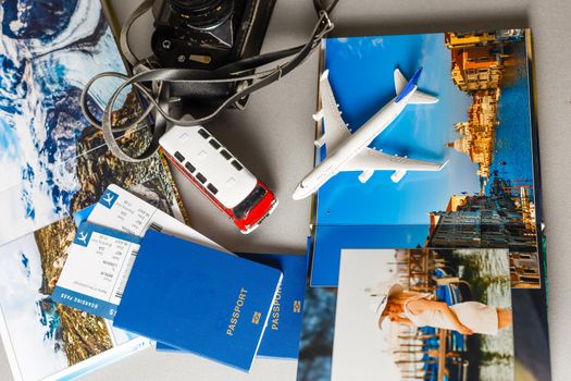 Passport and plane with holiday travel ideas.