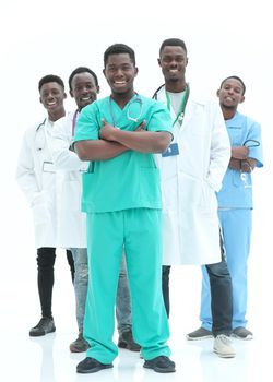 in full growth. smiling young doctors standing one by one