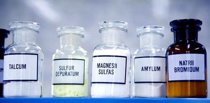 Composition of medicine bottle on white background
