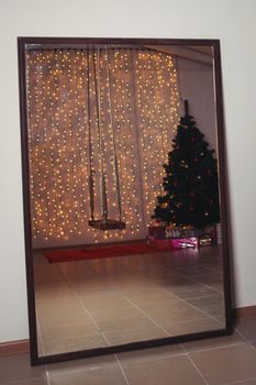 Reflection in the mirror of a Christmas tree