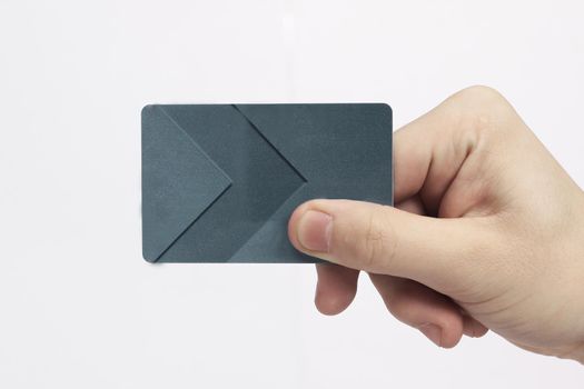 hand holding blank credit card.Plastic bank-card design mock up