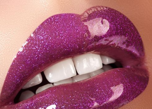 Glamour Magenta Gloss Lip Make-up. Fashion Makeup Beauty Shot. Close-up Female Sexy Full Lips with Celebrate Pink Gloss