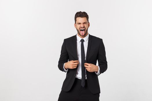 Portrait of a energetic young business man enjoying success, screaming against white - Isolated.