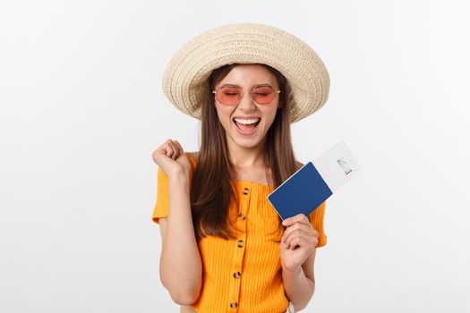 Portrait of happy tourist woman holding passport on holiday on white background.