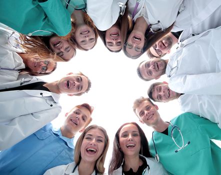group of successful doctors standing in a circle