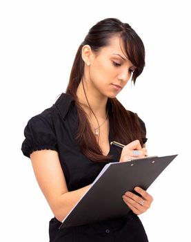 The beautiful business woman writes on a white background