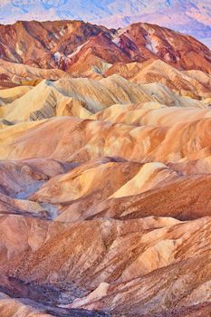 Endless ripples of color cover desert mountains at Zabriskie Point