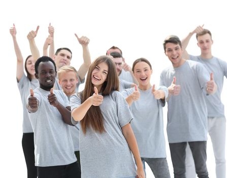 group of happy young people showing thumbs up.