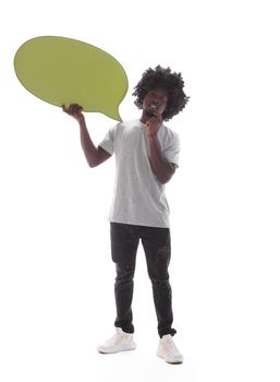 in full growth. curly-haired guy holding a speech bubble