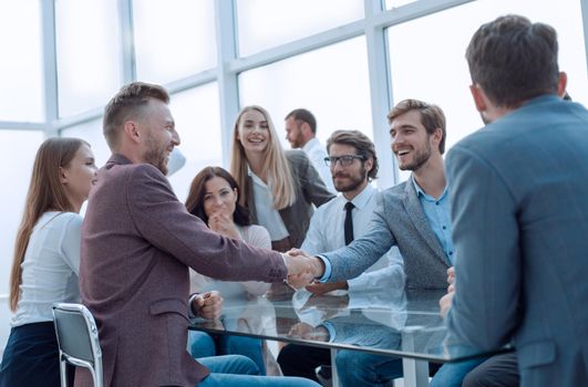 business partners greeting each other with a handshake
