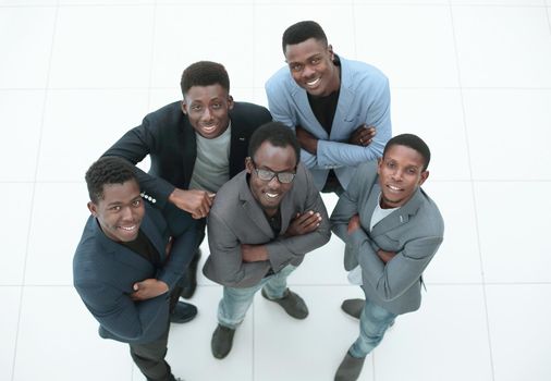 group of successful young people looking at the camera