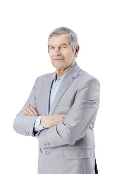 senior businessman standing with arms crossed on white background