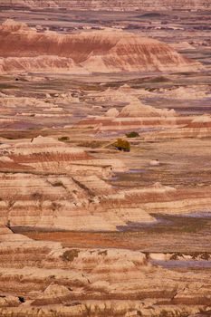 Endless layers of colorful sediment layers overlooking Badlands