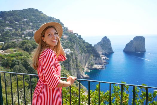 Young beautiful fashion woman strolling on Capri Island, Italy